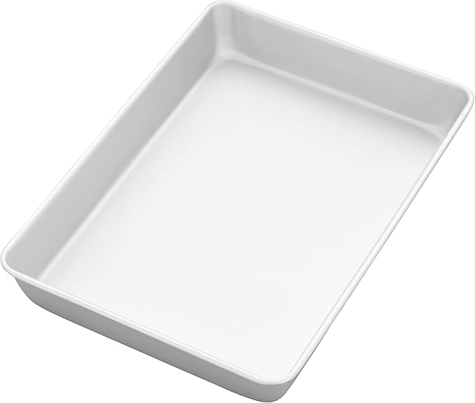Aluminum 9x13-inch rectangular baking pan, made of natural anodized aluminum, is PFAS-free and ideal for even heating.